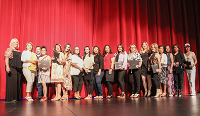 Graduates standing with GEDs