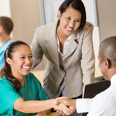 Candidate shaking hands with manager