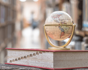 globe on top of a dictionary