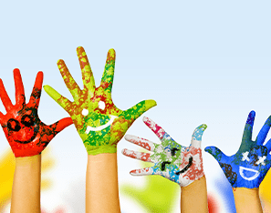 painted hands in various colors with smiley faces