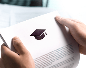 hands holding a grad acceptance letter