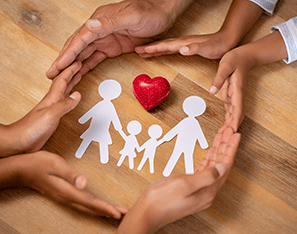 paper chain family with a heart and hands surrounding it