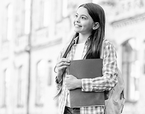 black and white photos of a girl holding books