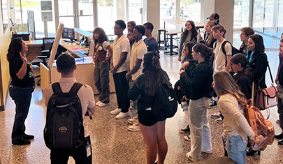 Students on a field trip attending an immersive experience