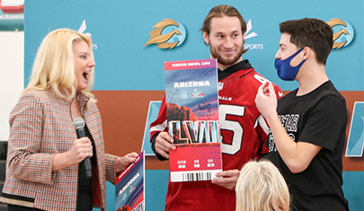 Kevin being awarded Super Bowl ticket by AZ Cardinal