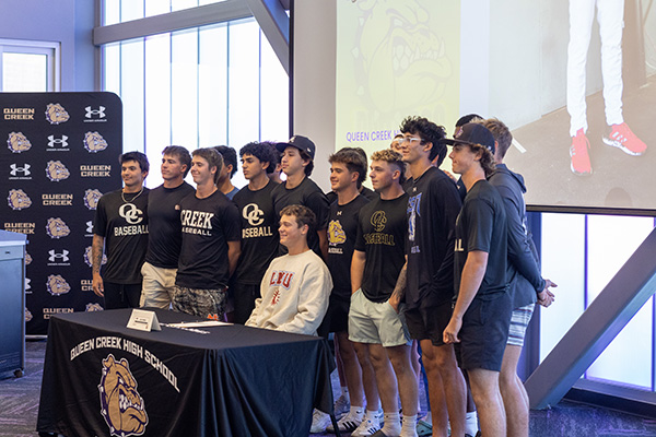 QCHS and CHS athletes at signing day