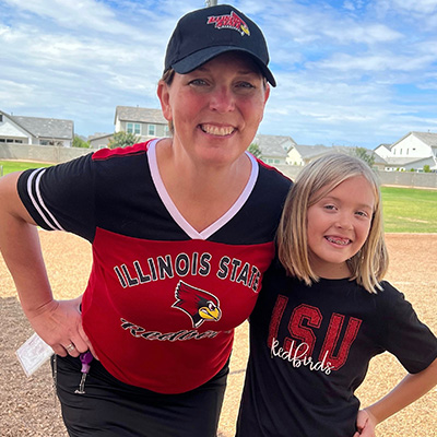 adult and student wearing sports apparel