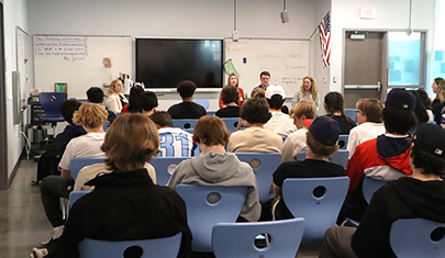 High school students attending career assembly