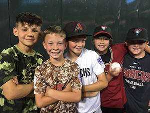 Queen Creek boy choir students at a Diamondbacks baseball game.