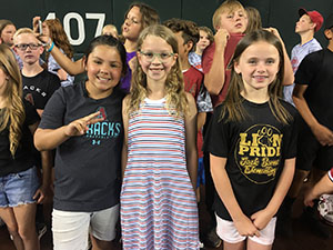 Queen Creek girl choir students at a Diamondbacks baseball game.