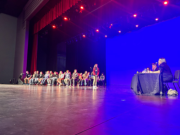 QCUSD students competing in the district spelling bee