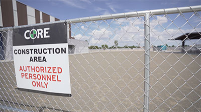 Sign on the fence for a construction area
