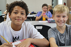Two elementary age boys smiling