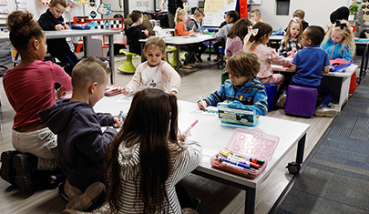Kindergarten students engaged in learning in the classroom