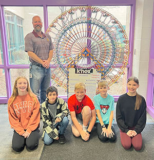 Engineering class team with their Knex project