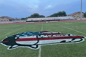Football field decorated for Patriot Day