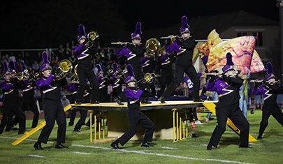 Marching band performing on field