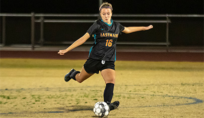 Girl playing soccer