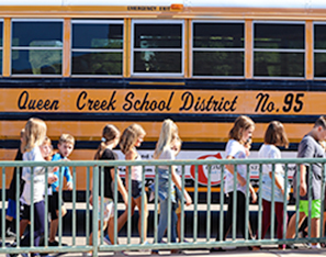 Students walking to their school bus