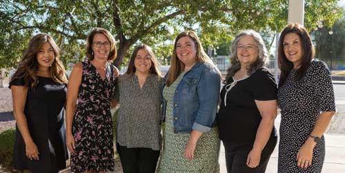 academic coaches posing together